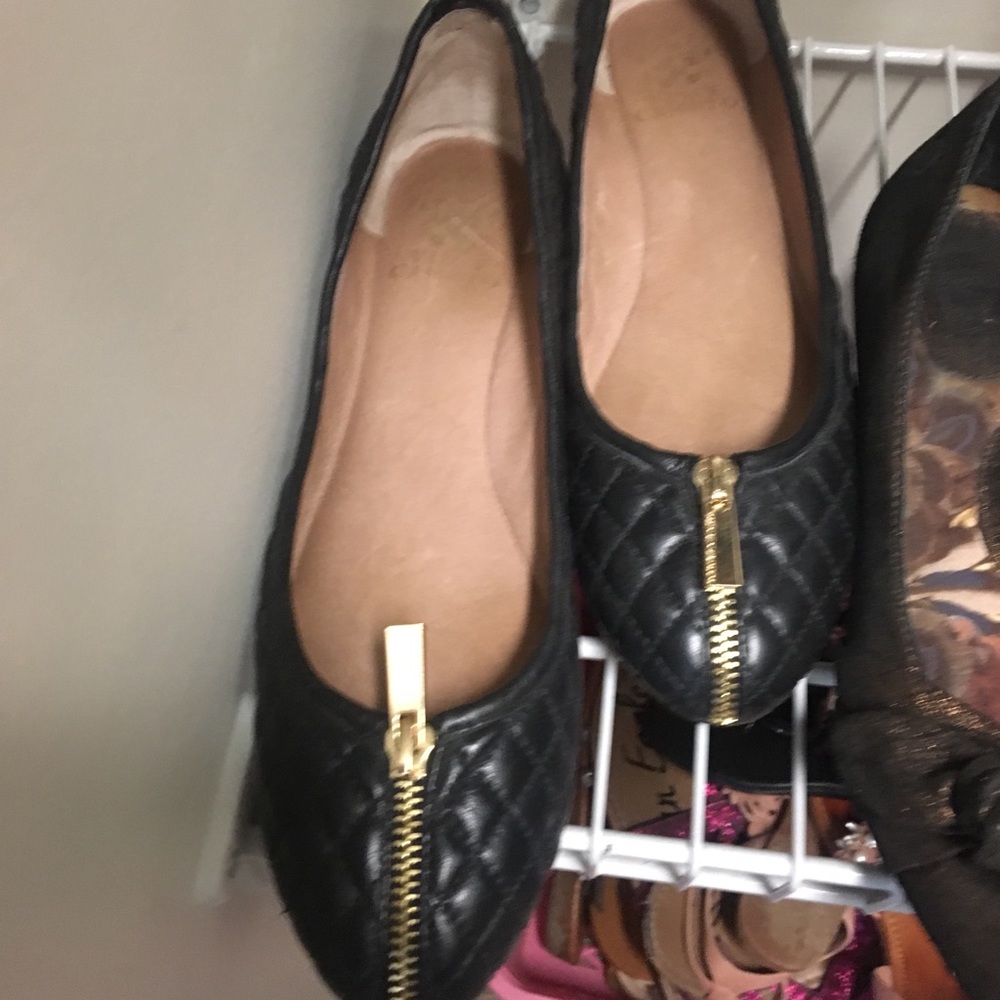 Black quilted leather flats